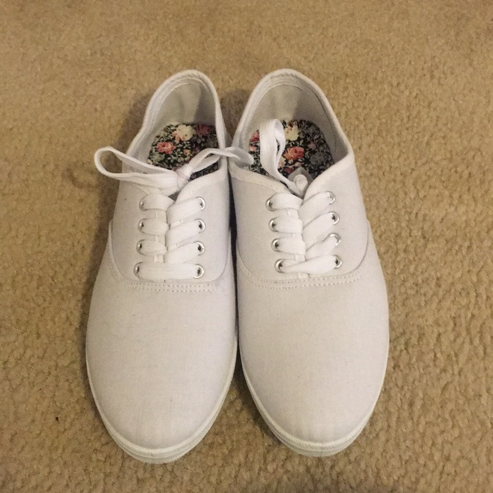 Plain white sneakers